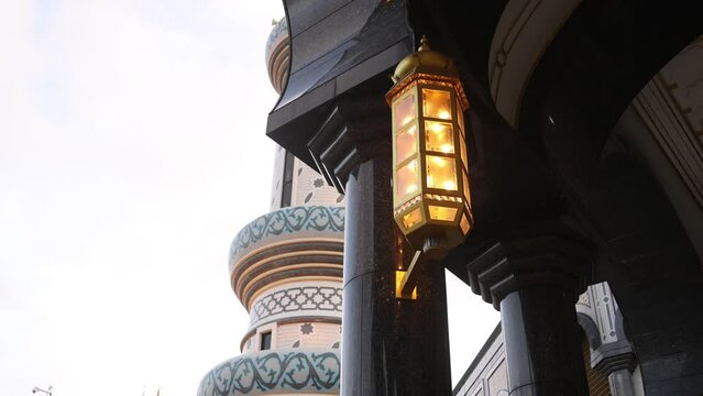 lantern lit at dusk at Jame' Asr Hassanil Bolkiah Mosque in Bandar Seri Bagawan in Brunei Darussalam