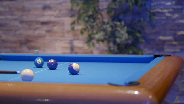 Snooker - pool table player aiming snook balls