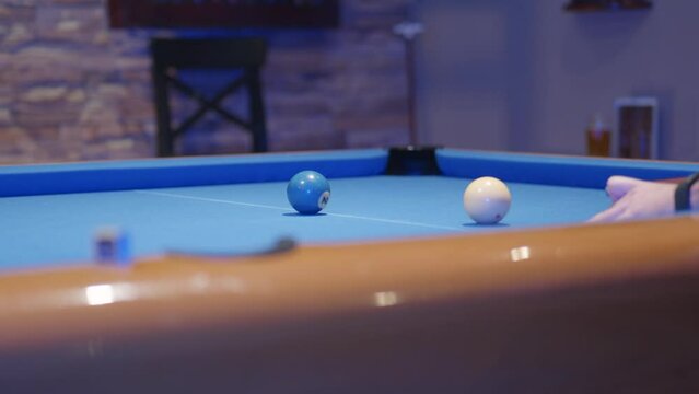 Snooker balls- a man aiming in a snook table