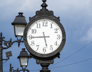 Clock on a street in the city of Baia Mare, Romania