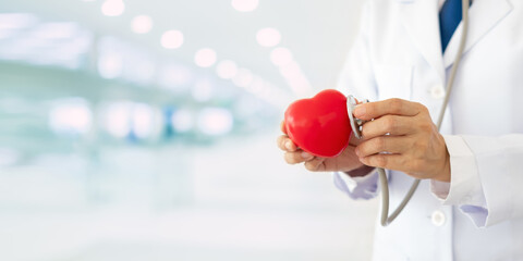 Cardiologist or physician using stethoscope for checkup heart disease,Irregular heartbeats,coronary artery disease.

