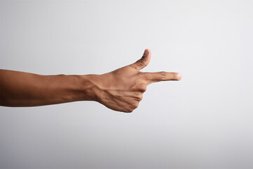 Cropped image of a male hand gesturing against a grey background