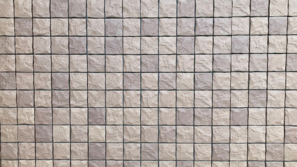Brown square tiles with bumpy surface