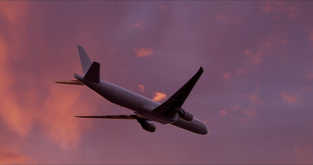 Close-up of Large airliner with passengers is flying on purple sky of bright sunset on sunny summer...