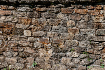 Wall built of natural stone. Can be used as background