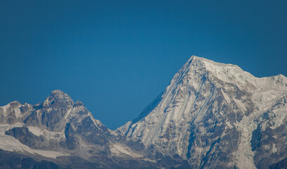 Beautiful snow-capped mountains of Tibet against the blue sky