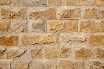 A natural stone wall can be used as a background