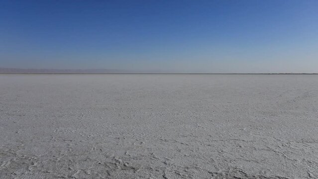 Vast salt flats of Chott el Jerid under clear blue skies, Tunis, wide shot