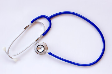 Stethoscope on white table background