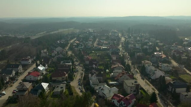 Village Houses On Foggy Morning In Chwarzno, Gdynia, Poland. aerial tilt-up shot