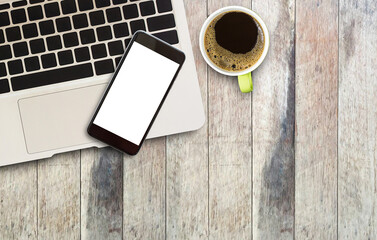 Laptop computer and smart phone with coffee cup