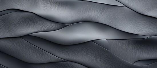 Obraz premium A closeup of a grey metal roof with wave patterns resembling silk. Tints and shades of electric blue create an eyelashlike pattern on its satin surface