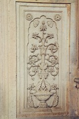 Intricately Carved Stone Frieze on medieval  cenotaph Wall in Broad Daylight at maharani ki chhatri Jaipur, Rajasthan, India 
