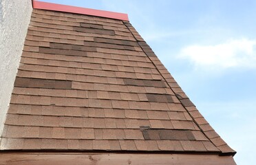 Patched and Mismatched Mansard Shingle Roof © Bill McKeon