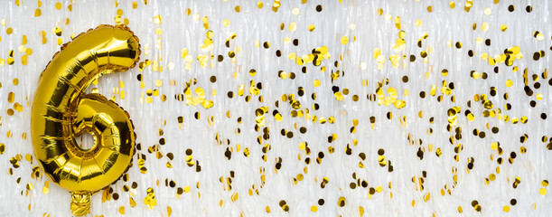 Gold balloon number 6, happy birthday congratulations. Golden balloons with copy space on white background. Number and digit six 6. Anniversary