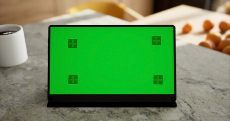 Tablet place on kitchen table, Green screen touchscreen, Close up display digital with mock up