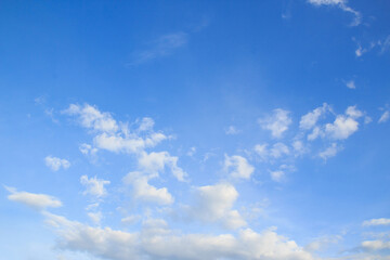 Naklejka na ściany i meble White cloud and blue sky background.