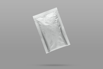 blank aluminum foil sachet packaging isolated on gray background
