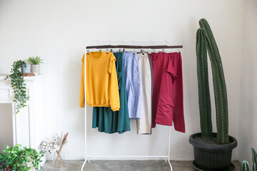 The clothes display looks Modern Minimalist Casual Comfortable hanging