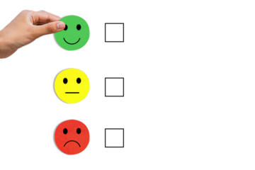 Emotion face symbol on Green, yellow and red wooden blocks, Consumers Show Satisfaction Rating concept by evaluating business success. Services and products and Customer Engagement, Quality Assessment