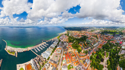 Helsingborg, Sweden. Panorama of the city in summer with port infrastructure. Oresund Strait....