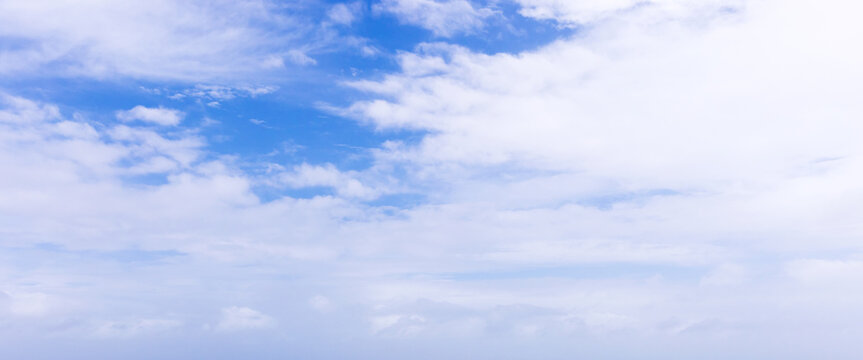 Blue sky panoramic background photo with white altocumulus clouds