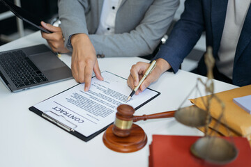 Businessman or Lawyer signing contract making a deal, classic business at office in the morning.