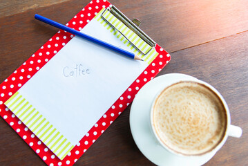 Smiling waitress wear apron hold notepad pen take order talk to clients serving restaurant guests couple choosing food drinks good customer service