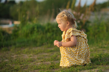 little girl joyous interaction with daisies brings attention to less obvious concern: seasonal allergies. manage outdoor allergies in children.