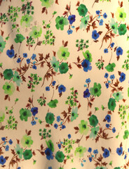 Textured fabric detail showcasing a vibrant, colorful floral print