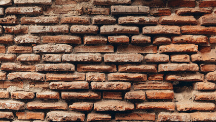 Red brick wall, textured and rough, wide masonry background