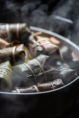 Coconut Sticky Rice and Banana wrapped with Banana Leaf, Thai Dessert