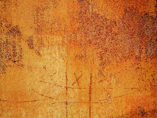 Orange color old metal surface with scratches. Background for design.