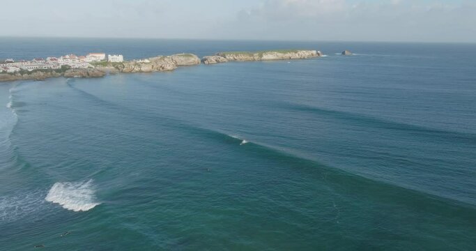 Aerial view of waves and coastline in Peniche, Portugal.