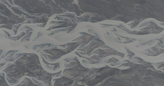 Aerial view of a glacial river water pattern, Iceland.