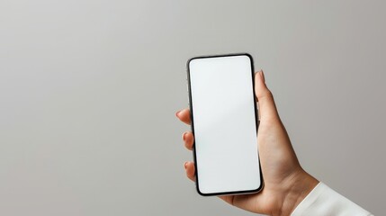 Woman hand holding phone on white background with copy space. - obrazy, fototapety, plakaty