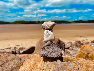Zelfklevend Fotobehang stones on the beach © Christian