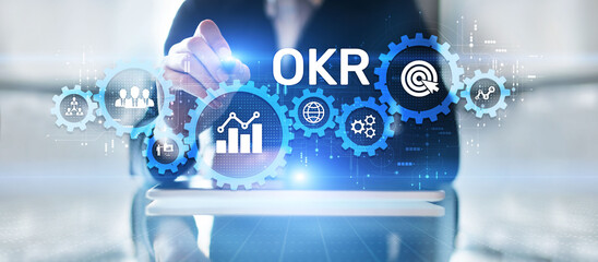 OKR Objective key result business finance concept on screen.