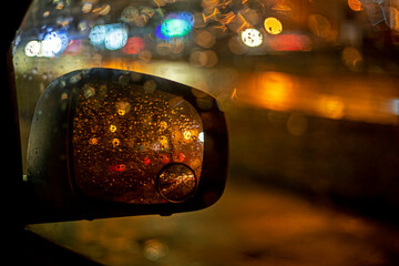 yeast drops on the side mirror of a car. Poor visibility on the road