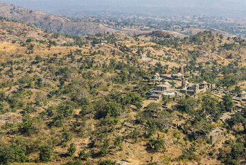 Fototapeta premium isolated temple situated in the middle of forests at morning from flat angle