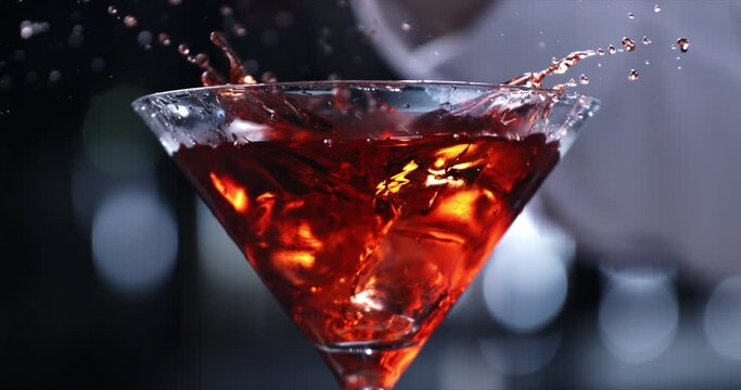 Super slow motion macro unshelled fresh harvested rice grains seeds are falling on farmer or agriculturist hand for quality control in rural cereal production agriculture farmland at 60 fps.