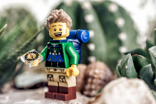 Hiker with backpack searching right direction. Illustrative editorial