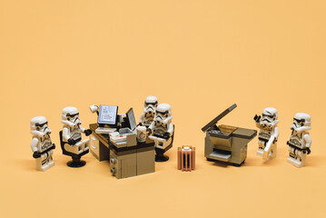Naklejka premium Stormtroopers in the office. Business situations concept. Illustrative editorial