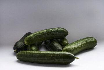 cucumbers on a wooden board