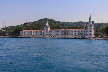 View from the water of the Bosphorus Strait to ancient palaces and buildings. Public place on the street of Istanbul, T&uuml;rkiye.