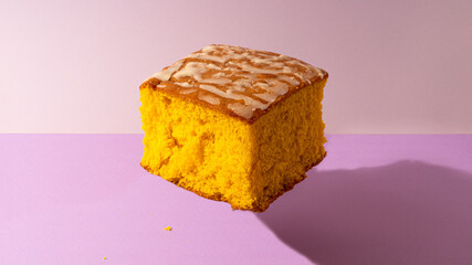 Pao de Lo - typical cake of Portugal on purple background