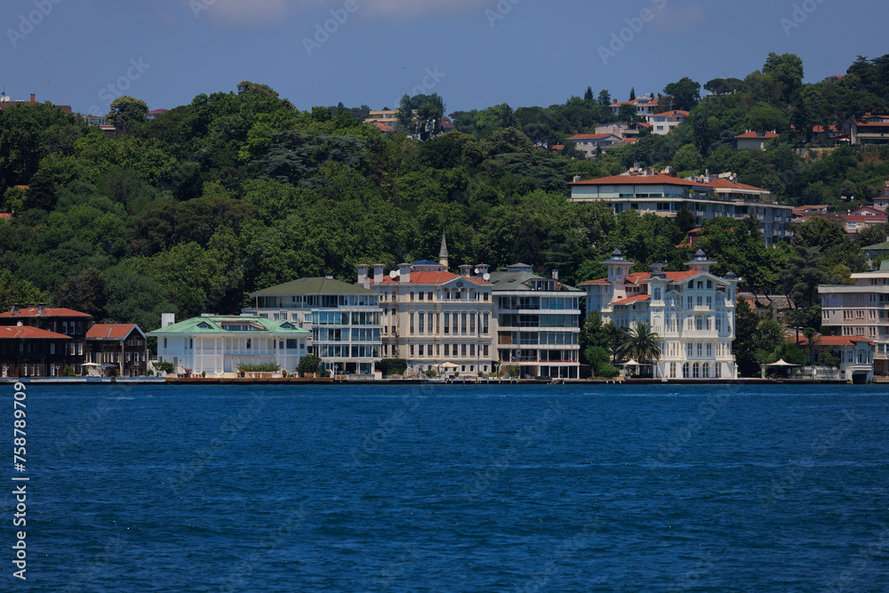 Wall mural Cityscape View from the water to buildings in the city of Istanbul in public places