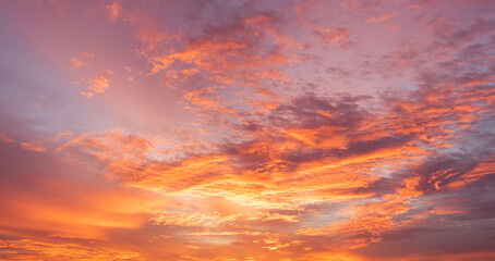  Panoramic view of sunset golden and blue sky nature background.
Colorful dramatic sky with cloud...