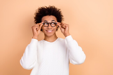 Photo of funny funky curious man wear trendy white clothes look offer promo optics empty space...