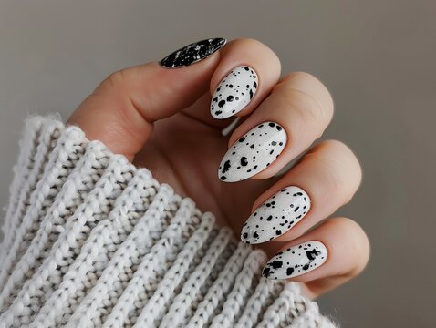 fun black and white polka dot manicure